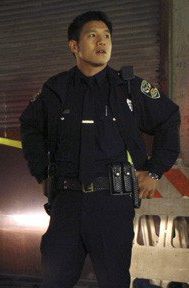 James Huang playing a police officer