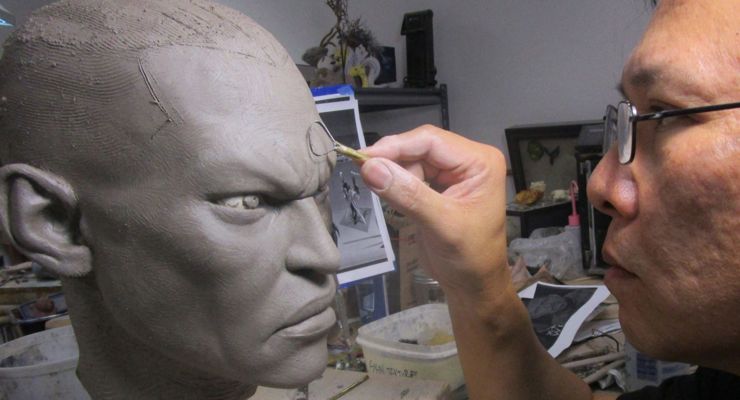 Steve Wang working on Statue of Lucian from Riot Games