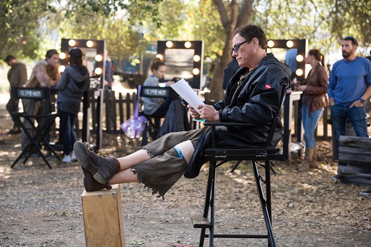 Jean Claude Van Johnson studying His Script