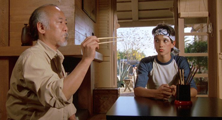 Pat Morita as Mr. Miyagi and Ralph Macchio as Daniel in The Karate Kid (1984)